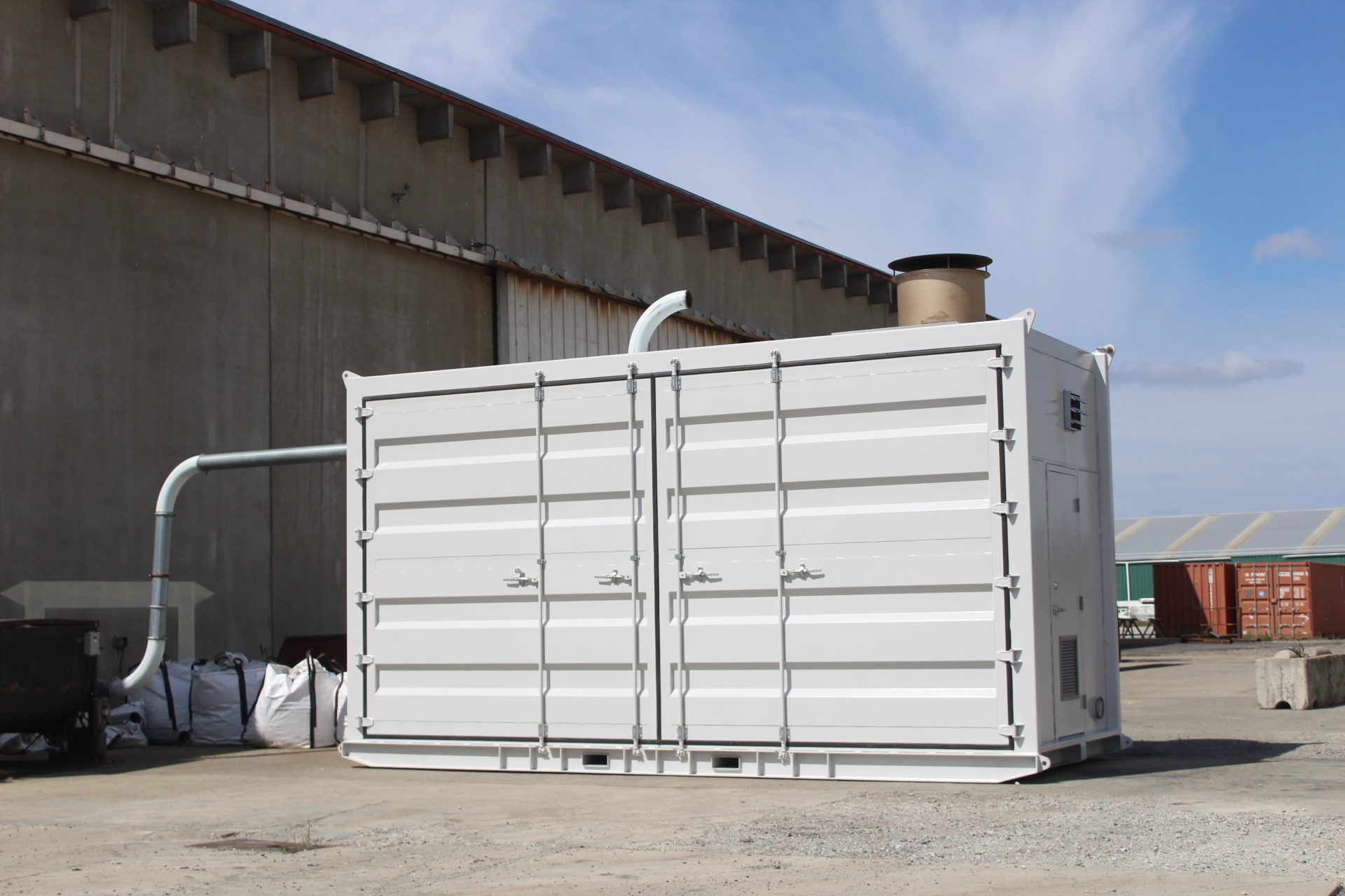 Qualterra biomass processing unit producing biochar soil amendments